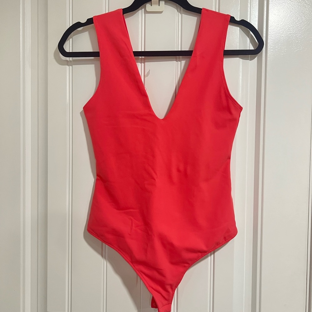 Free people hot pink deep v neck bodysuit size large